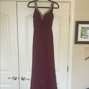 Sleeveless Burgundy V-Neck Prom Gown with Jeweled Trim